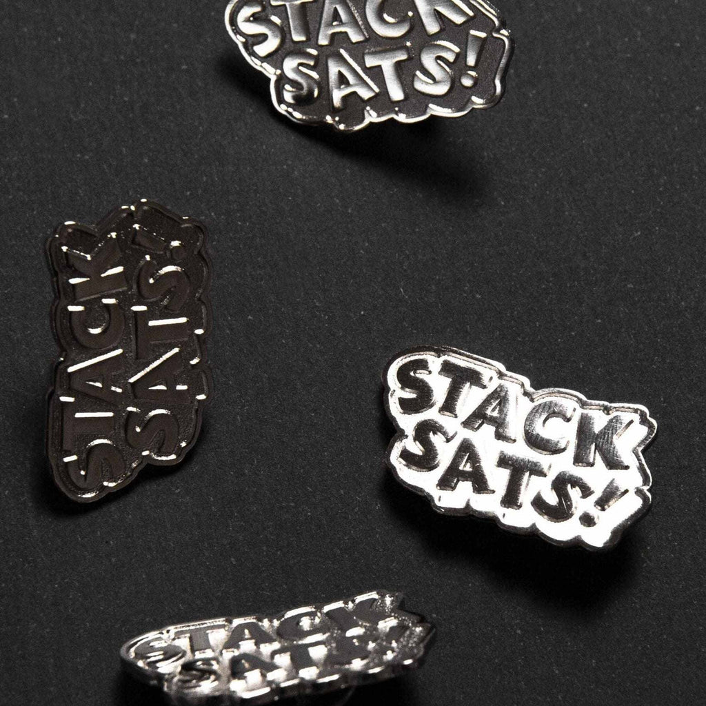 Kanuto Stack Sats Bitcoin metal pin with minimalist design for jackets and backpacks