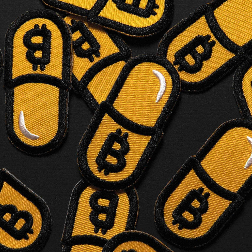 Kanuto Orange Pill Patch for jackets and backpacks with Bitcoin design