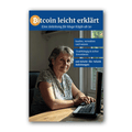 Vorderseite von „Bitcoin leicht erklärt“ in Blau, mit einer Frau am Notebook