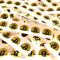 Set of 10 small gold Bitcoin stickers with glossy foil on black paper