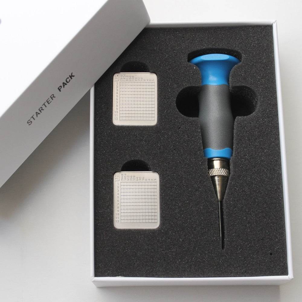 Compact Tiny Seed Titan backup device made of corrosion-resistant pure titanium with guided punch slots and discreet NFC cover