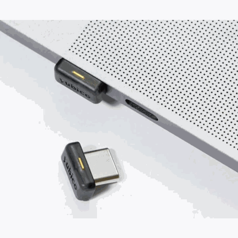 YubiKey 5C Nano USB-C security key permanently in USB-C port for 2FA and multi-protocol authentication